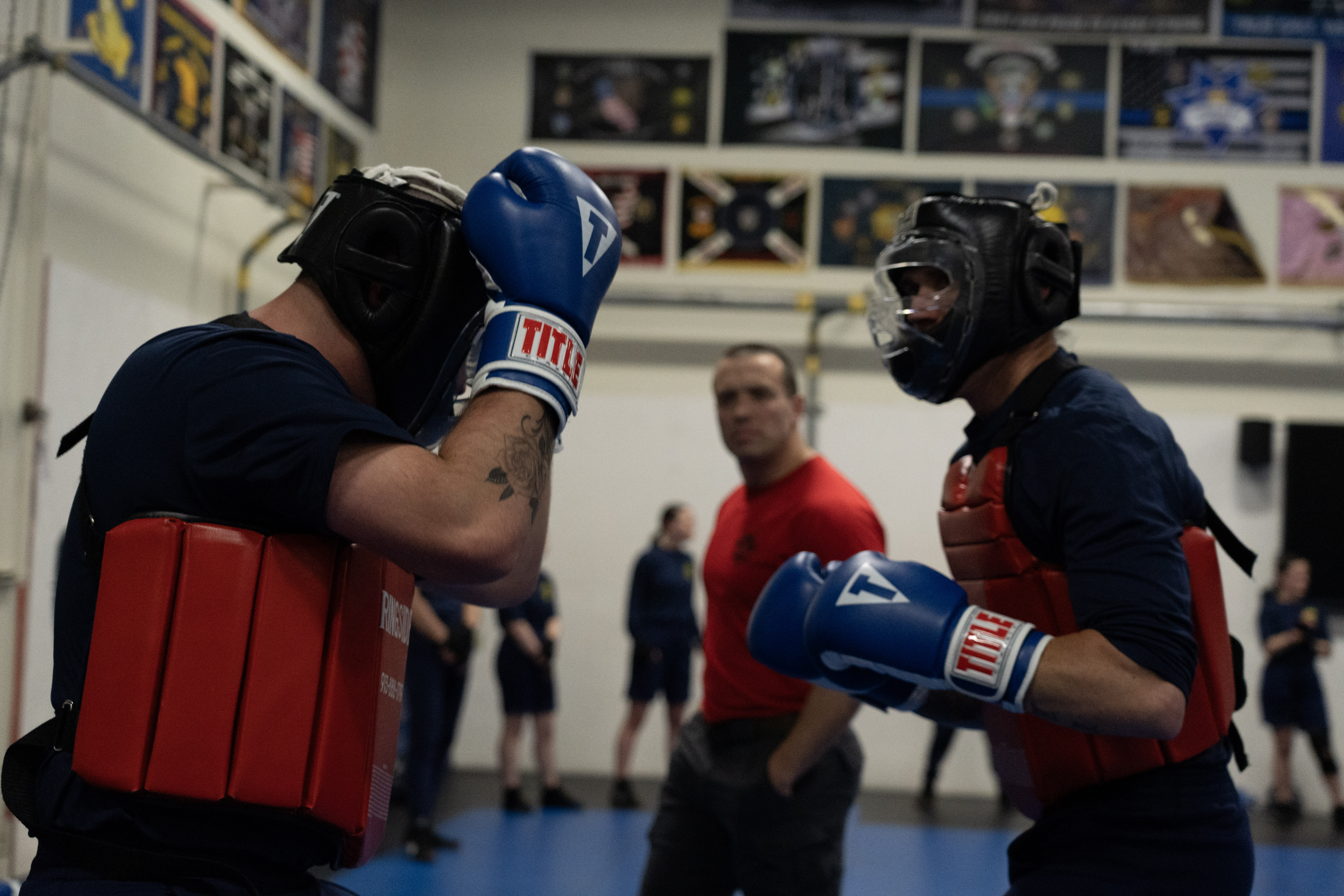 A photo of two Sacramento Police Department cadets boxing at the Academy