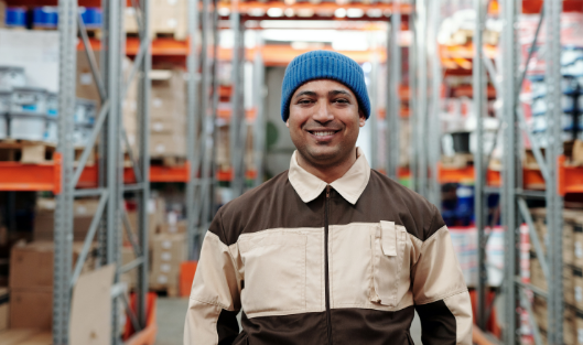 Blue collar worked in warehouse.
